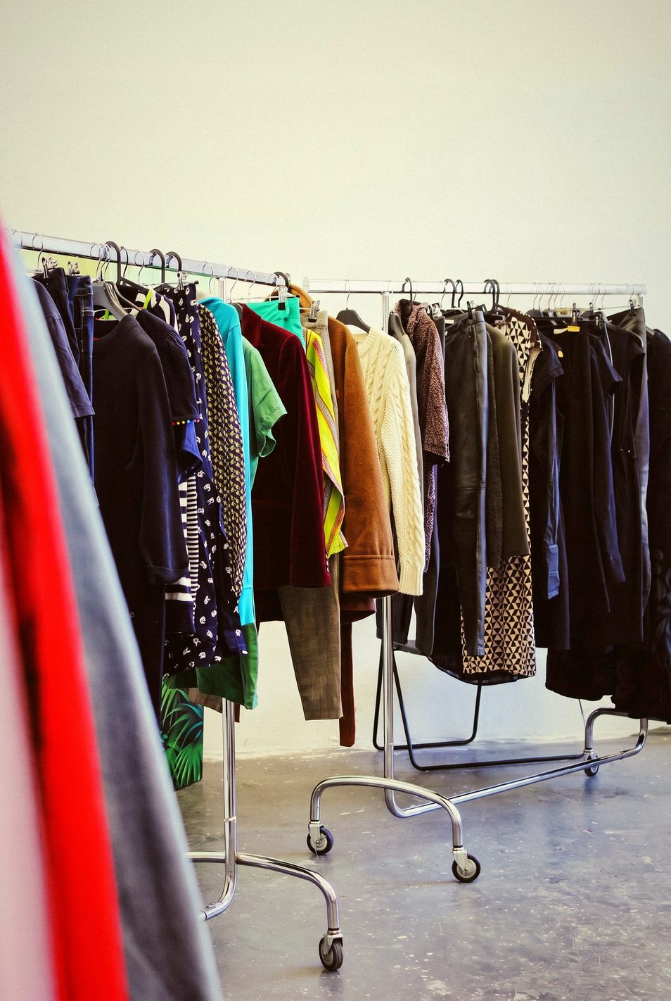 Pressed curated garments on rails